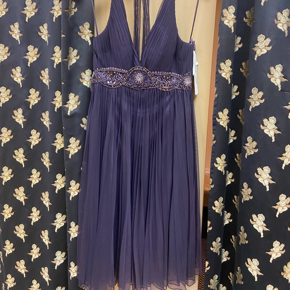 Wow! Eggplant halter with beaded empire waistline.